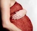 Боли внизу живота при беременности: причины и лечение